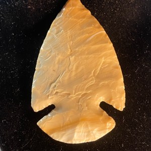 Caramel colored glass arrowhead