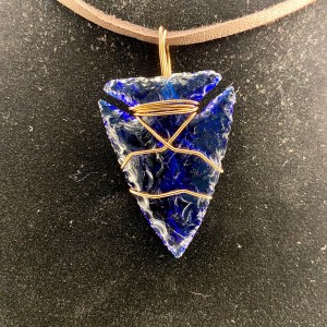 Blue glass arrowhead necklace